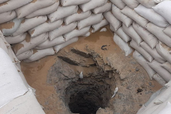 Group of citizens engaged in illegal gold mining was piled with stones