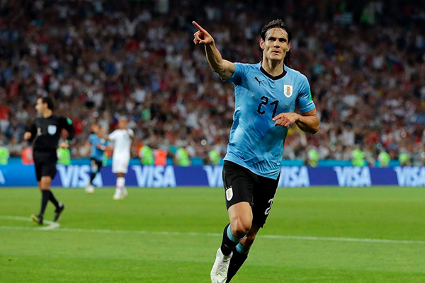 Edinson Cavani double sends Portugal home
