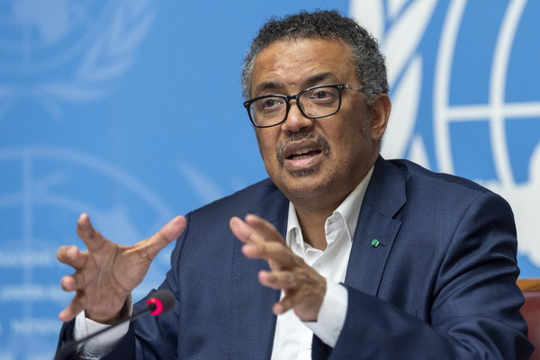 WHO chief announces removal of pandemic status for COVID-19