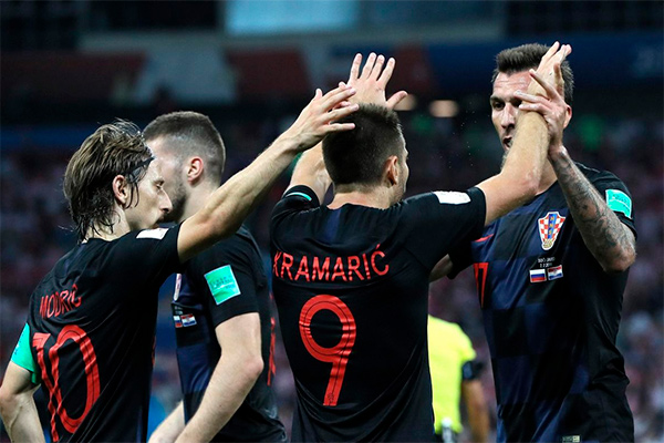 Croatia beat Russia on penalties to set up England semi-final